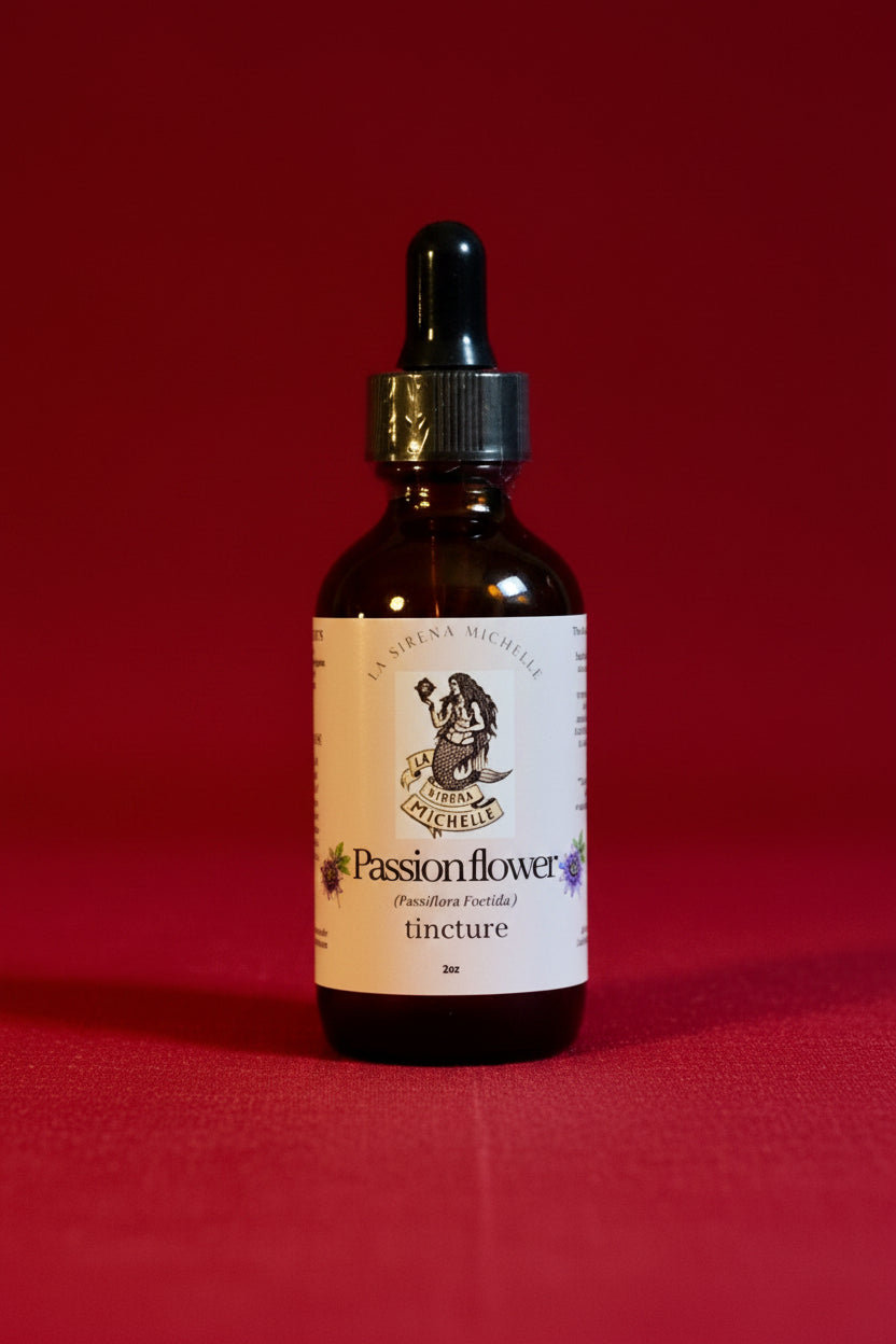 A dark amber glass dropper bottle with a cream label reading 'Passionflower' and 'Infusion' on a textured red fabric background.